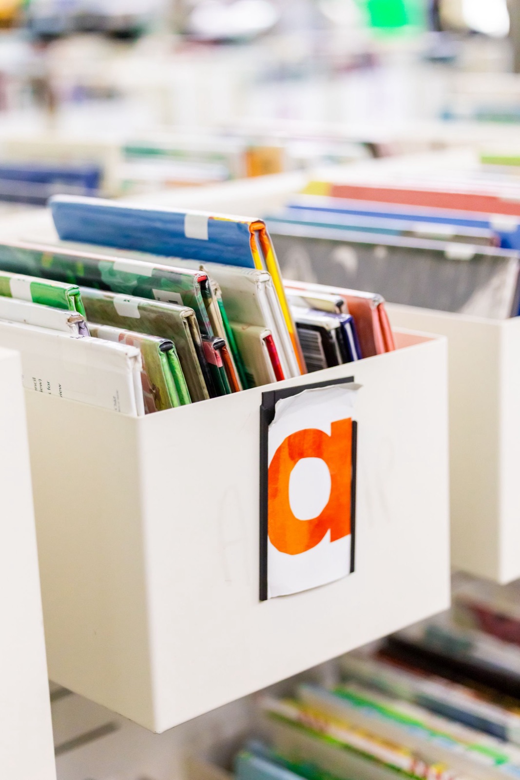 Indexed files arranged in an open office drawer.
